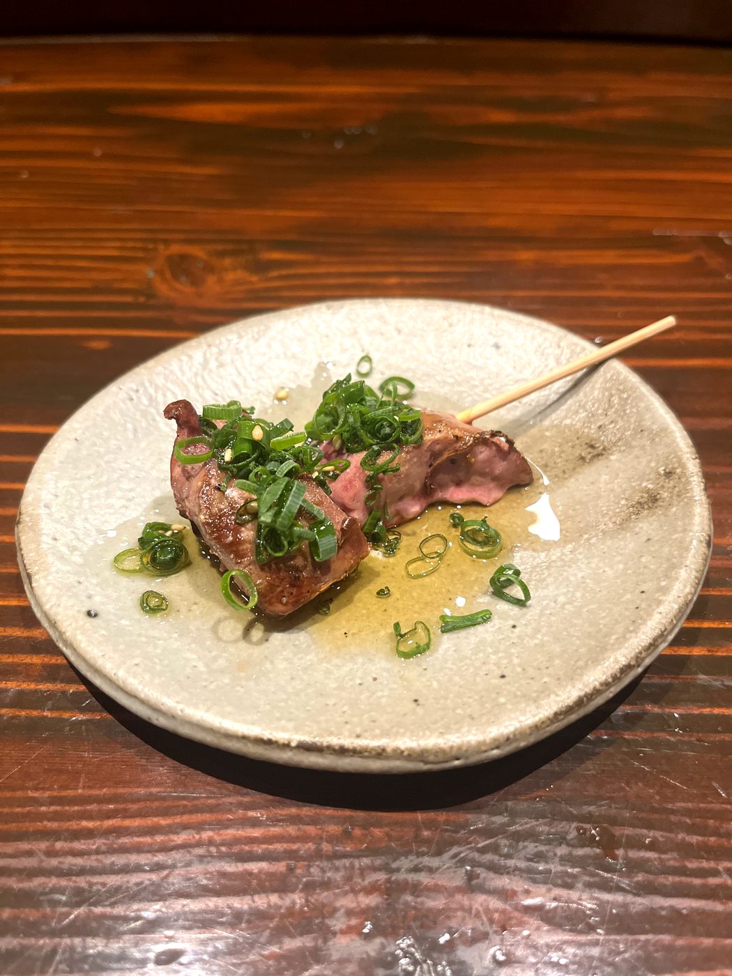 Reba (chicken liver) yakitori with scallions and tare sauce